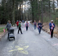 The Beaver Pond Loopers hit the road with colorful pink streamers.